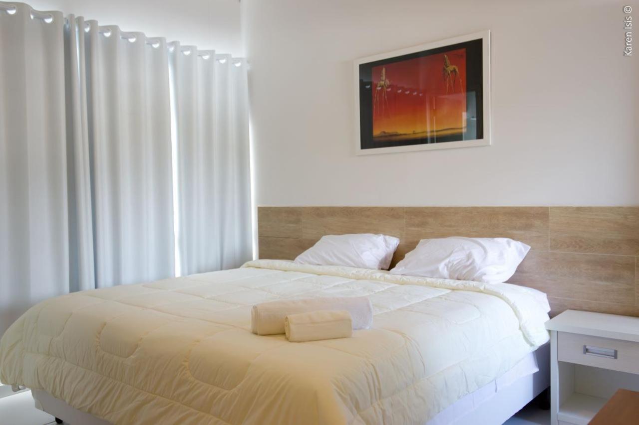 Pedreira Flat Hotel Bagian luar foto