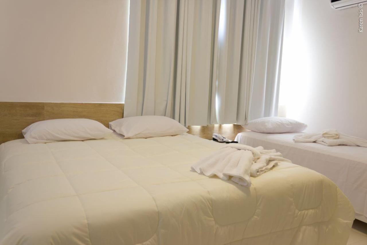 Pedreira Flat Hotel Bagian luar foto
